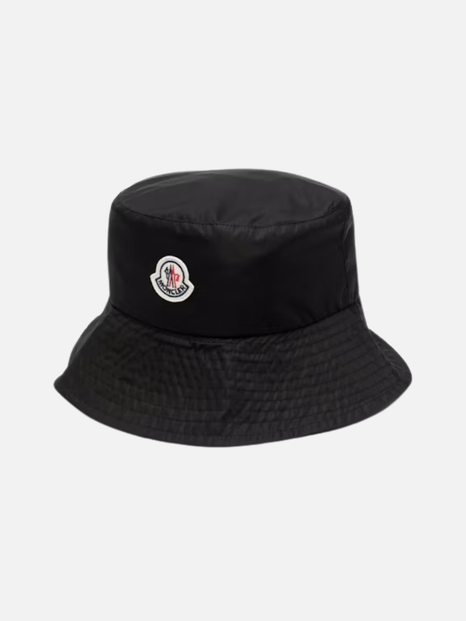 Moncler Logo Patch Bucket Hat Black Brand: Moncler Color: Black with white, red, and blue felted logo patch Material: 100% Polyamide (Technical Nylon) Moncler Logo Patch Bucket Hat Black
